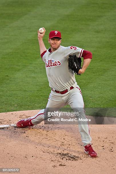 Pitcher Roy Halladay of the Philadelphia Phillies pitches during his perfect game against the Florida Marlins in Sun Life Stadium on May 29, 2010 in...