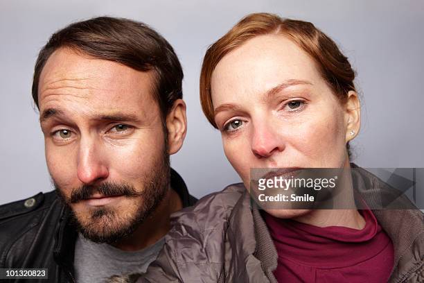 portrait of couple with attitude - portrait smile stock-fotos und bilder