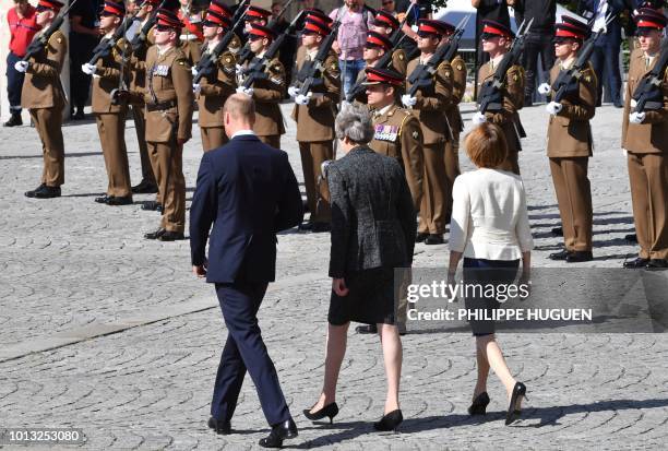 French Minister of the Armed Forces Florence Parly, Britain's Prime Minister Theresa May, Britain's Prince William, the Duke of Cambridge, leave the...