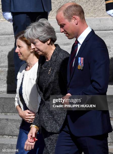 French Minister of the Armed Forces Florence Parly, Britain's Prime Minister Theresa May, Britain's Prince William, the Duke of Cambridge, leave the...