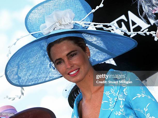 Racing fans display the latest in spring fashion, on Oaks Day, traditionally Ladies Day, held at Flemington Racecourse, Melbourne, Australia....