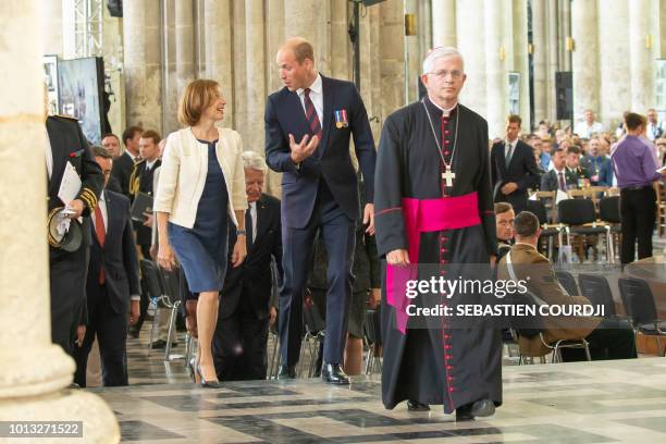 Britain's Prince William, the Duke of Cambridge and French Minister of the Armed Forces, Florence Parly, attend a religious ceremony to mark the...