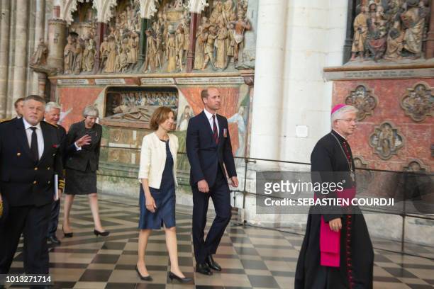 Britain's Prince William, the Duke of Cambridge and French Minister of the Armed Forces, Florence Parly, attend a religious ceremony to mark the...