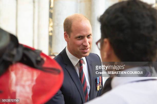 Prince William Duke of Cambridge attends a religious ceremony to mark the 100th anniversary of the World War I Battle of Amiens, at the Cathedral in...
