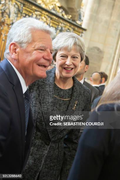 Britain's prime minister Theresa May and Joachim Gauck, former German president attend a religious ceremony to mark the 100th anniversary of the...