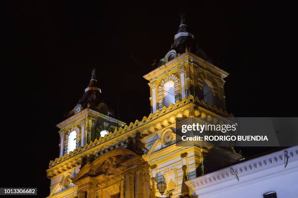 View of French artist Laurent Langlois' work "Heritage" illuminating the San Francisco church in the historical center of Quito on August 7 during...