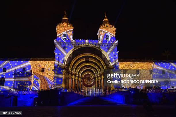 View of French artist Laurent Langlois' work "Heritage" illuminating the San Francisco church in the historical center of Quito on August 7 during...
