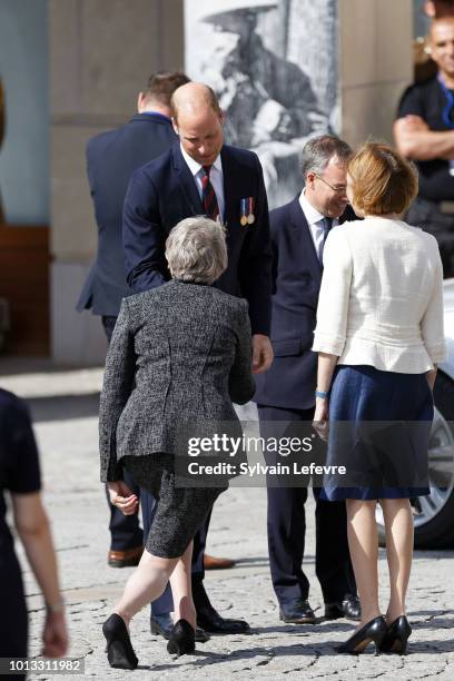 Britain's Prince William, Duke of Cambridge, Britain's Prime Minister Theresa May, and French Minister of the Armed Forces, Florence Parly, leave...