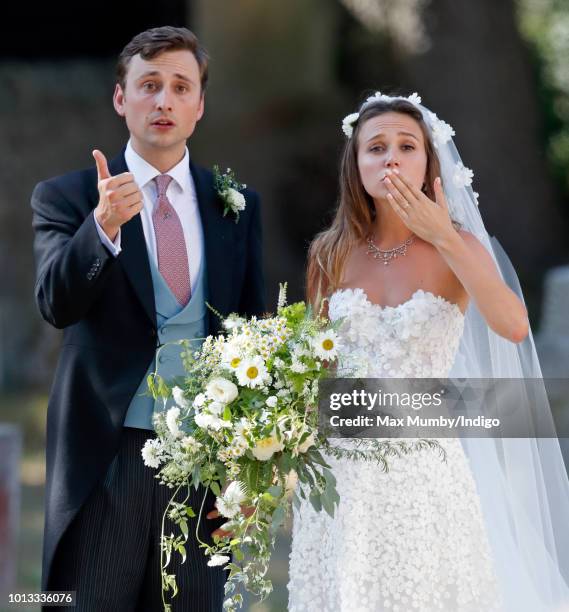 Charlie van Straubenzee and Daisy Jenks leave the church of St Mary the Virgin after their wedding on August 4, 2018 in Frensham, England. Prince...