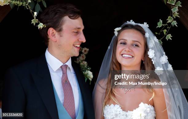 Charlie van Straubenzee and Daisy Jenks leave the church of St Mary the Virgin after their wedding on August 4, 2018 in Frensham, England. Prince...