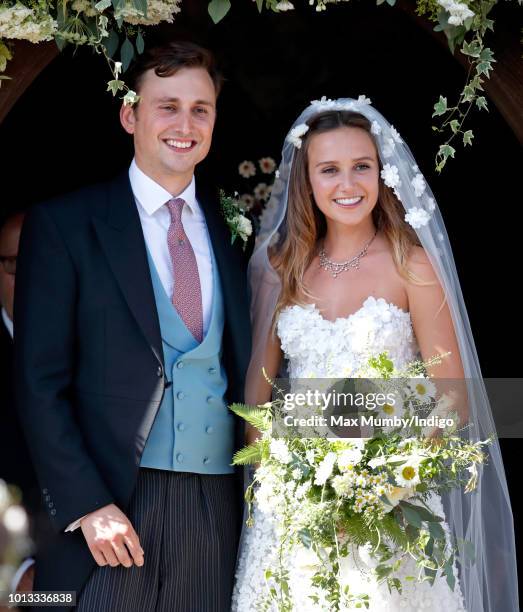 Charlie van Straubenzee and Daisy Jenks leave the church of St Mary the Virgin after their wedding on August 4, 2018 in Frensham, England. Prince...