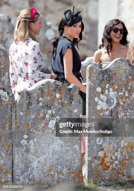 Meghan, Duchess of Sussex attends the wedding of Charlie van Straubenzee and Daisy Jenks at the church of St Mary the Virgin on August 4, 2018 in...