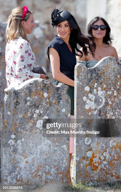 Meghan, Duchess of Sussex attends the wedding of Charlie van Straubenzee and Daisy Jenks at the church of St Mary the Virgin on August 4, 2018 in...