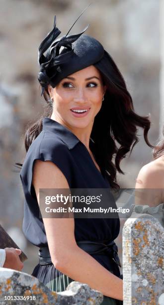 Meghan, Duchess of Sussex attends the wedding of Charlie van Straubenzee and Daisy Jenks at the church of St Mary the Virgin on August 4, 2018 in...