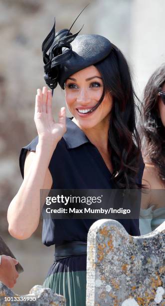 Meghan, Duchess of Sussex attends the wedding of Charlie van Straubenzee and Daisy Jenks at the church of St Mary the Virgin on August 4, 2018 in...