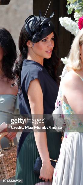 Meghan, Duchess of Sussex attends the wedding of Charlie van Straubenzee and Daisy Jenks at the church of St Mary the Virgin on August 4, 2018 in...