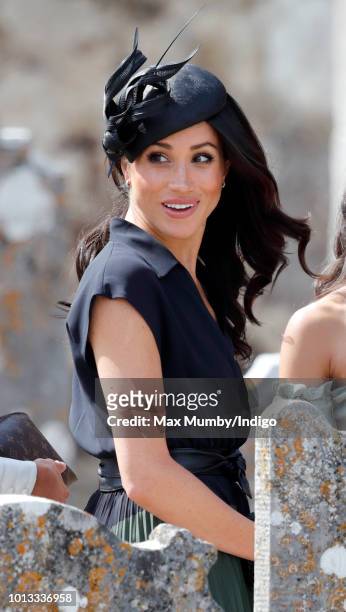 Meghan, Duchess of Sussex attends the wedding of Charlie van Straubenzee and Daisy Jenks at the church of St Mary the Virgin on August 4, 2018 in...