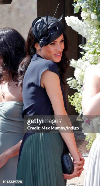 Meghan, Duchess of Sussex attends the wedding of Charlie van Straubenzee and Daisy Jenks at the church of St Mary the Virgin on August 4, 2018 in...