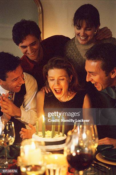 woman birthday party, friends, surprise, warmth, thrill, home - verjaardagskaars stockfoto's en -beelden