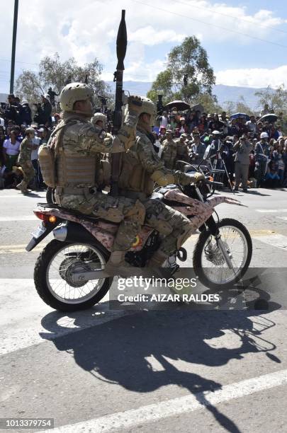 Soldiers take part in a parade for the commemoration of the 193rd anniversary of the creation of the Bolivian Armed Forces in Cochabamba, Bolivia on...