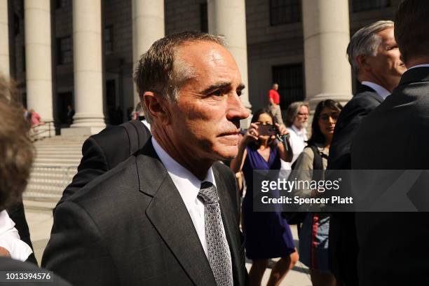 Rep. Chris Collins walks out of a New York court house after being charged with insider trading on August 8, 2018 in New York City. Federal...