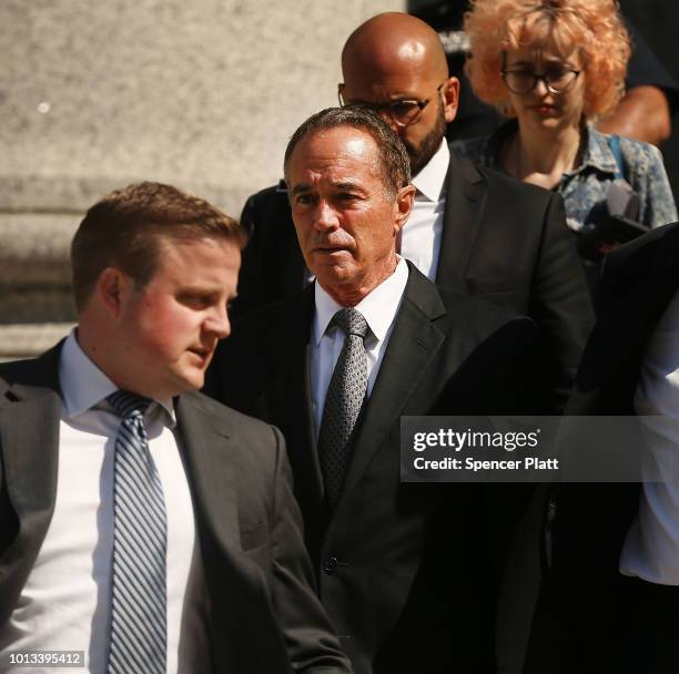 Rep. Chris Collins walks out of a New York court house after being charged with insider trading on August 8, 2018 in New York City. Federal...