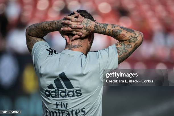Sergio Ramos of Real Madrid C.F. Holds his behind his head with tattoos as he warms up before the International Champions Cup soccer match between...