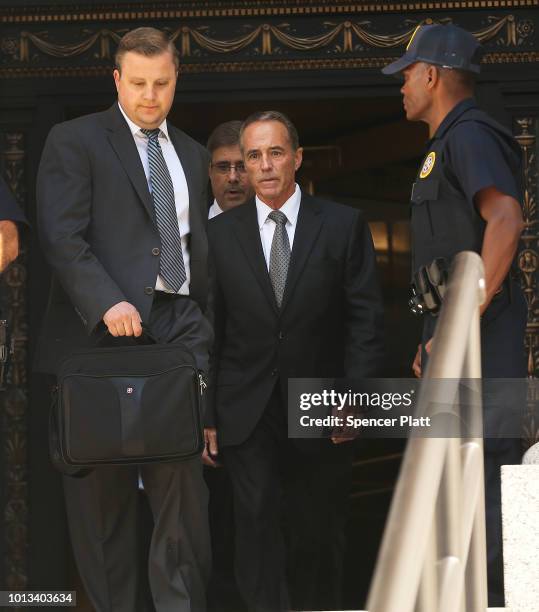 Rep. Chris Collins walks out of a New York court house after being charged with insider trading on August 8, 2018 in New York City. Federal...