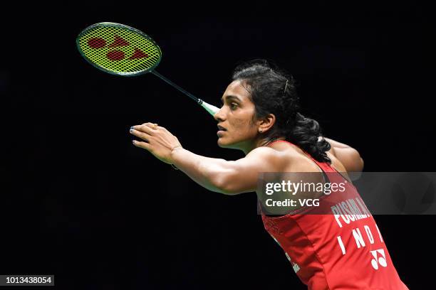 Pusarla Venkata Sindhu of India competes in the Women's Singles semi-final match against Akane Yamaguchi of Japan on day six of BWF World...