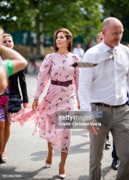 Danish Crown Princess Mary of Denmark, Mary Elizabeth Donaldson wearing pink dress with belt is seen outside CIFF fair during the Copenhagen Fashion...