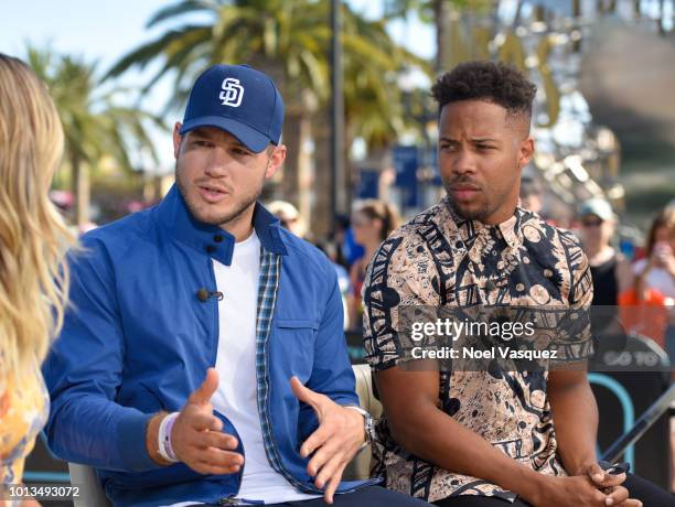 Colton Underwood and Wills Reid visit "Extra" at Universal Studios Hollywood on August 8, 2018 in Universal City, California.