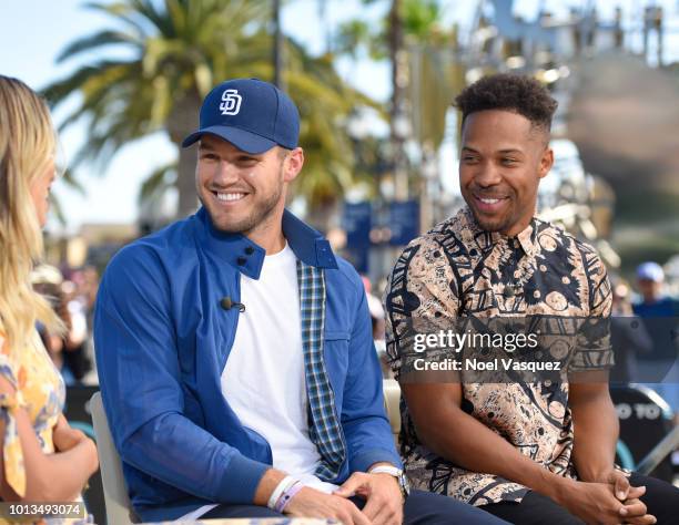 Colton Underwood and Wills Reid visit "Extra" at Universal Studios Hollywood on August 8, 2018 in Universal City, California.