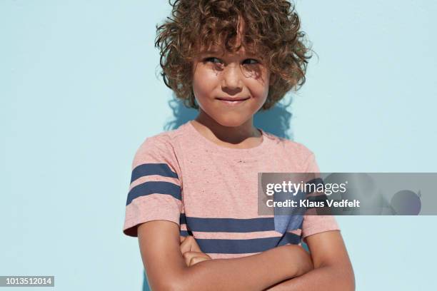 portrait of cool boy looking in camera and smiling - fashion kids stock pictures, royalty-free photos & images