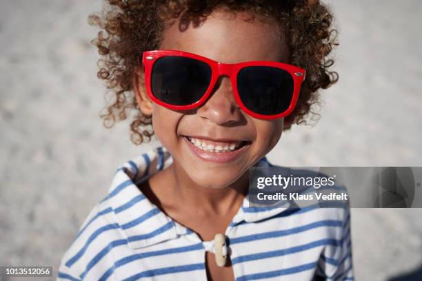 portrait of cool boy with sunglasses - red white and blue beach stock pictures, royalty-free photos & images