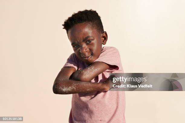 child portrait on studio background - boy in hard hat stock-fotos und bilder