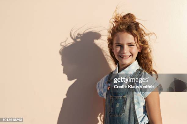 child portrait on studio background - kids fashion stockfoto's en -beelden