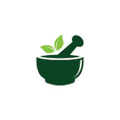 Mortar and pestle pharmacy nature herbal health logo design vector template