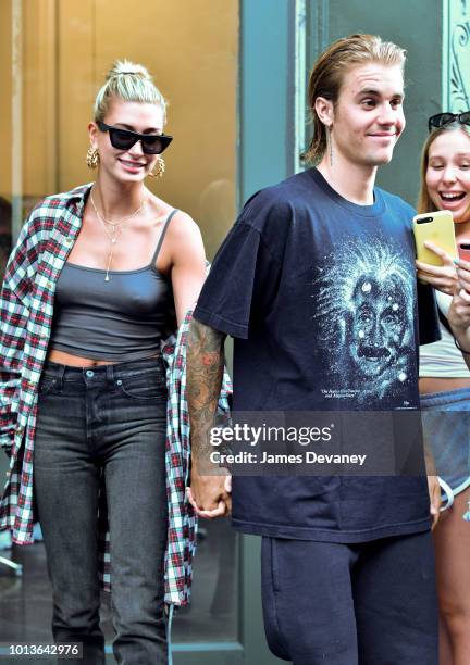 Hailey Baldwin and Justin Bieber visit Cutler hair salon in SoHo on August 8, 2018 in New York City.