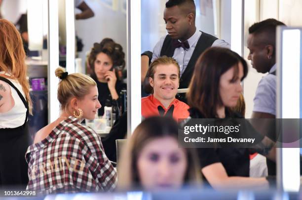 Hailey Baldwin and Justin Bieber visit Cutler hair salon in SoHo on August 8, 2018 in New York City.