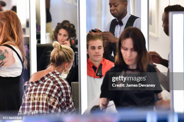 Hailey Baldwin and Justin Bieber visit Cutler hair salon in SoHo on August 8, 2018 in New York City.