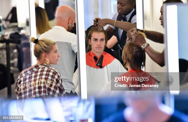 Hailey Baldwin and Justin Bieber visit Cutler hair salon in SoHo on August 8, 2018 in New York City.