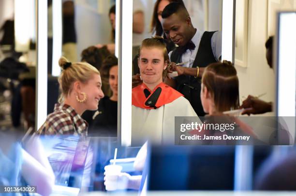 Hailey Baldwin and Justin Bieber visit Cutler hair salon in SoHo on August 8, 2018 in New York City.