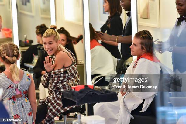 Hailey Baldwin and Justin Bieber visit Cutler hair salon in SoHo on August 8, 2018 in New York City.