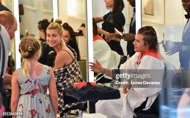 Hailey Baldwin and Justin Bieber visit Cutler hair salon in SoHo on August 8, 2018 in New York City.