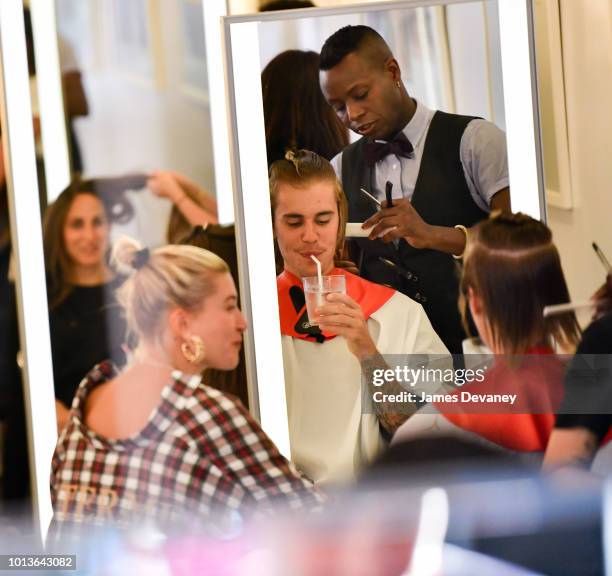Hailey Baldwin and Justin Bieber visit Cutler hair salon in SoHo on August 8, 2018 in New York City.
