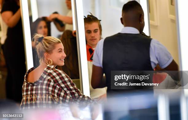 Hailey Baldwin and Justin Bieber visit Cutler hair salon in SoHo on August 8, 2018 in New York City.