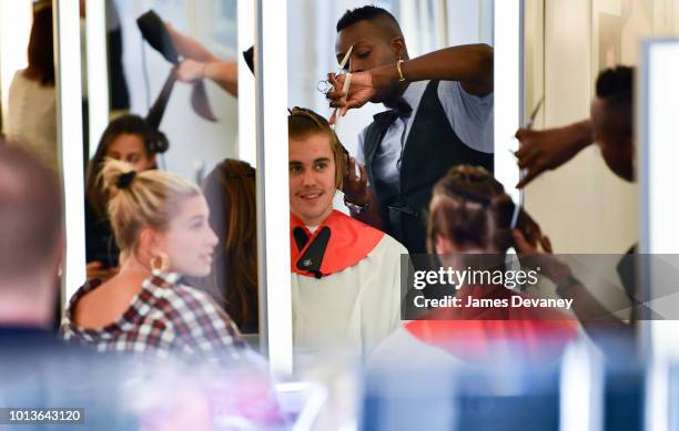 Hailey Baldwin and Justin Bieber visit Cutler hair salon in SoHo on August 8, 2018 in New York City.
