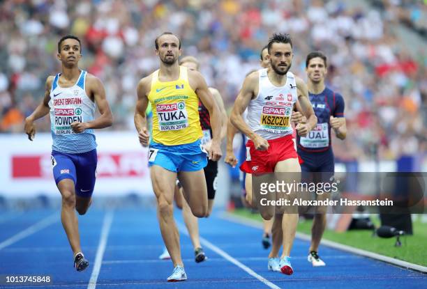 Daniel Rowden of Great Britain, Amel Tuka of Bosnia and Herzegovina and Adam Kszczot of Poland compete in the Men's 800m Qualification start during...