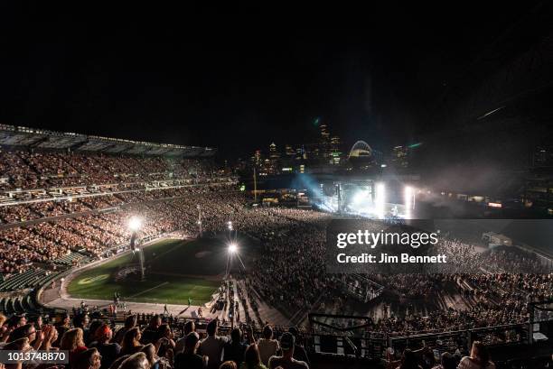 Cheerings fans fill Safeco Field for Pearl Jam's live performance on August 8, 2018 in Seattle, Washington.