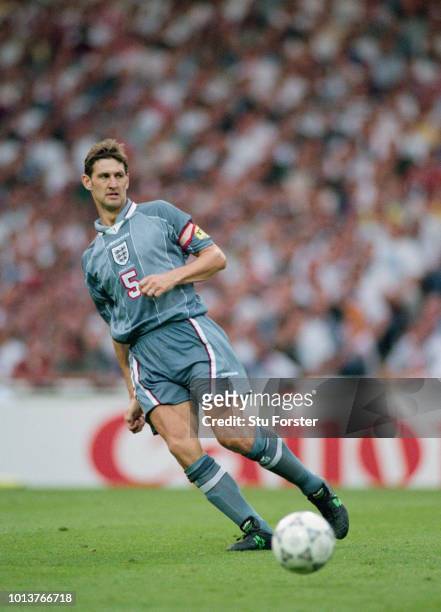 England player Tony Adams in action during the 1996 European Championships semi final against Germany at Wembley Stadium on June 26, 1996 in London,...